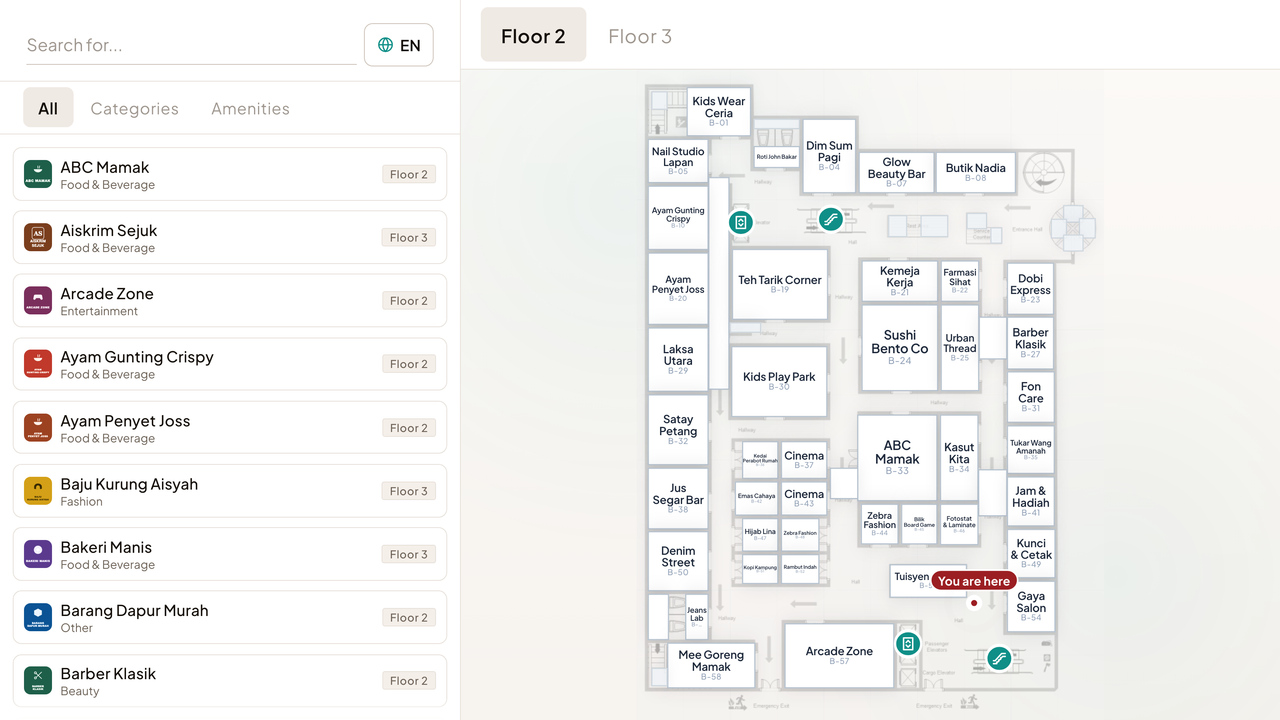 The Layar wayfinding kiosk showing a mall floor map with a shop directory beside it.